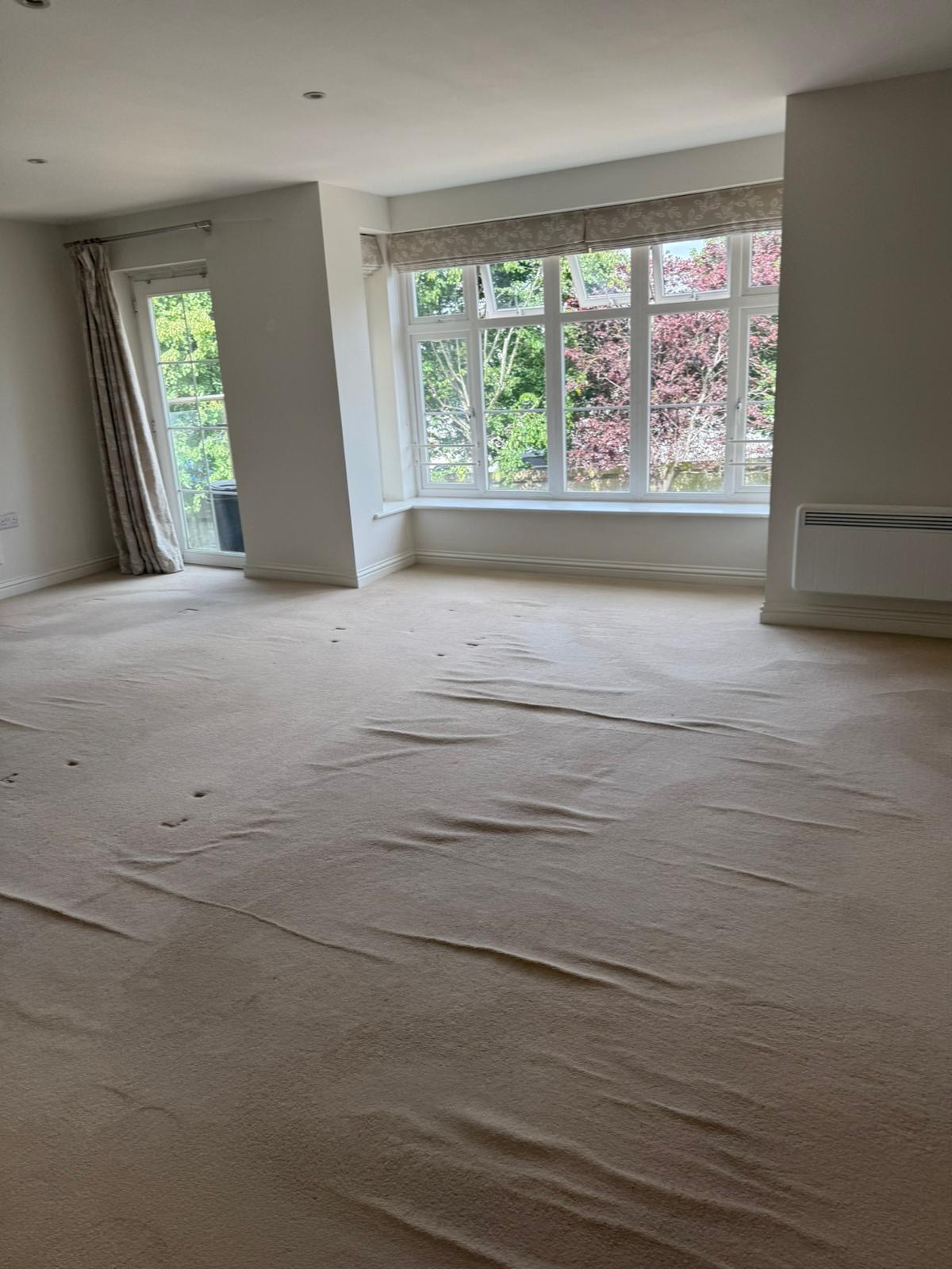 Empty living room prepared for end of tenancy deep clean