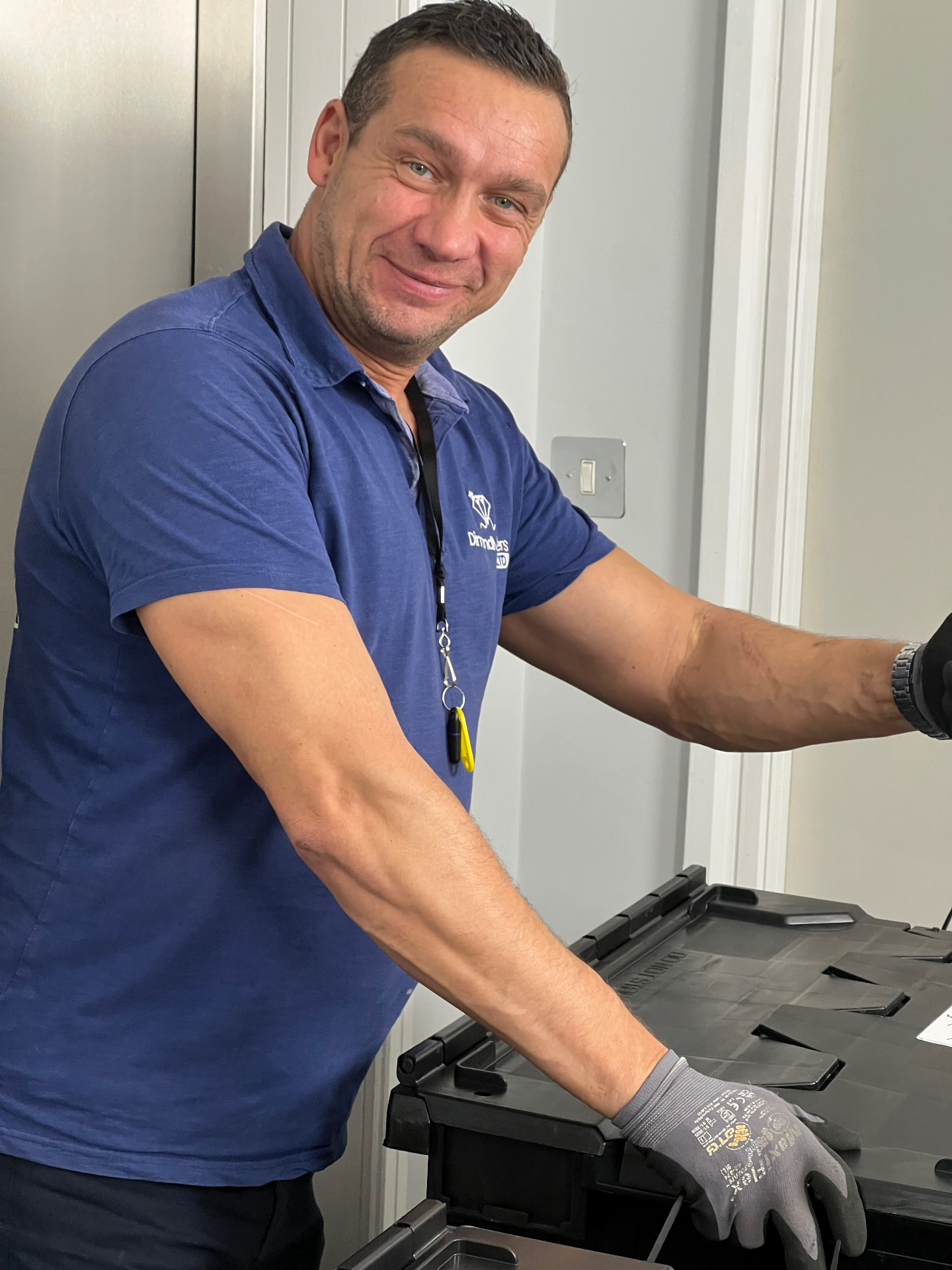Dimond Movers team member packing crates during a professional office relocation