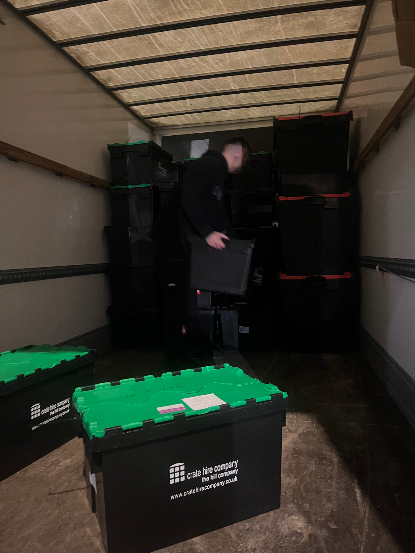 Dimond Movers operative loading IT equipment into the van for an office move